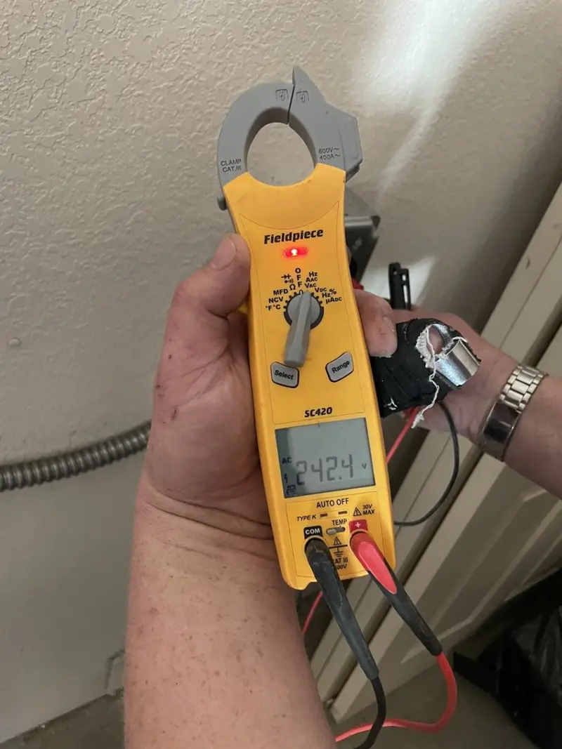 Voltage testing with clamp meter during Generator Installation in Rossville